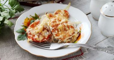 Рецепт Мяса по-французски с сыром и помидорами в духовке