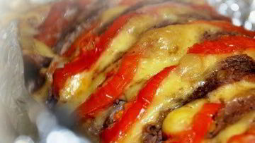 Рецепт Мяса, запеченного с сыром и помидорами