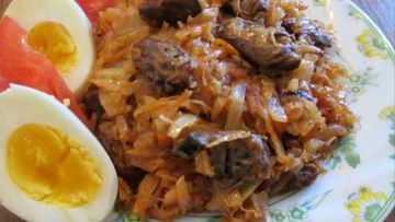 Рецепт Тушенной капусты с куриными сердечками