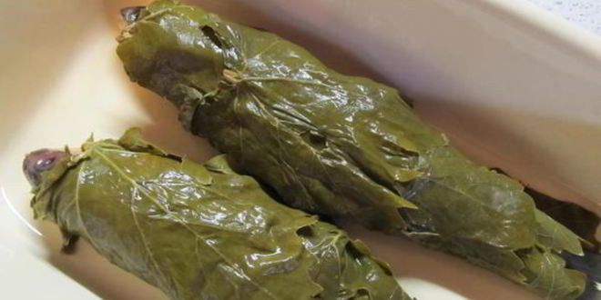 Рецепт рыбы запеченной в виноградных листьях