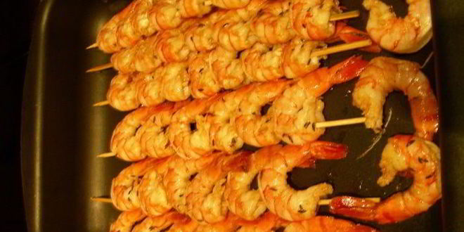 Рецепт нежной поленты с хрустящим горошком и запеченными креветками