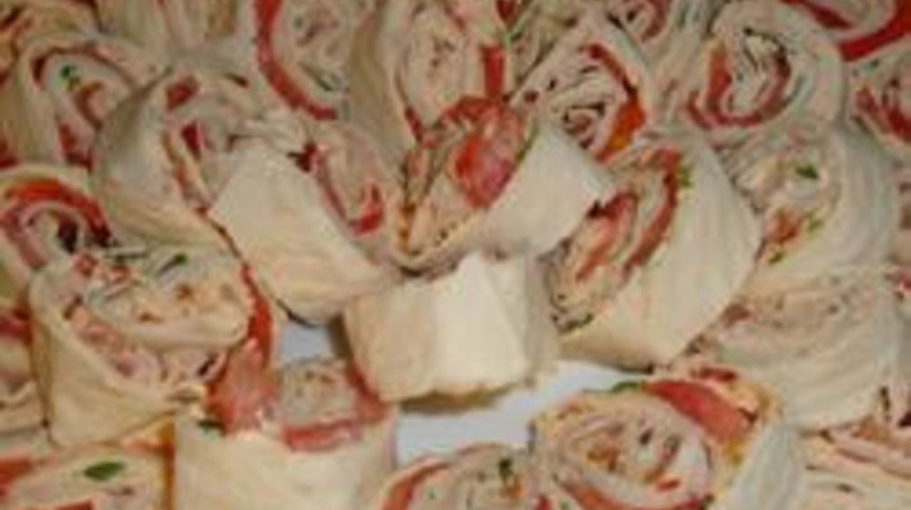 Как приготовить рулетики из лаваша с семгой и ветчиной