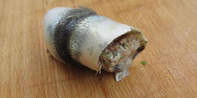 Рецепт фаршированных яиц с рулетиками из малосольной кильки